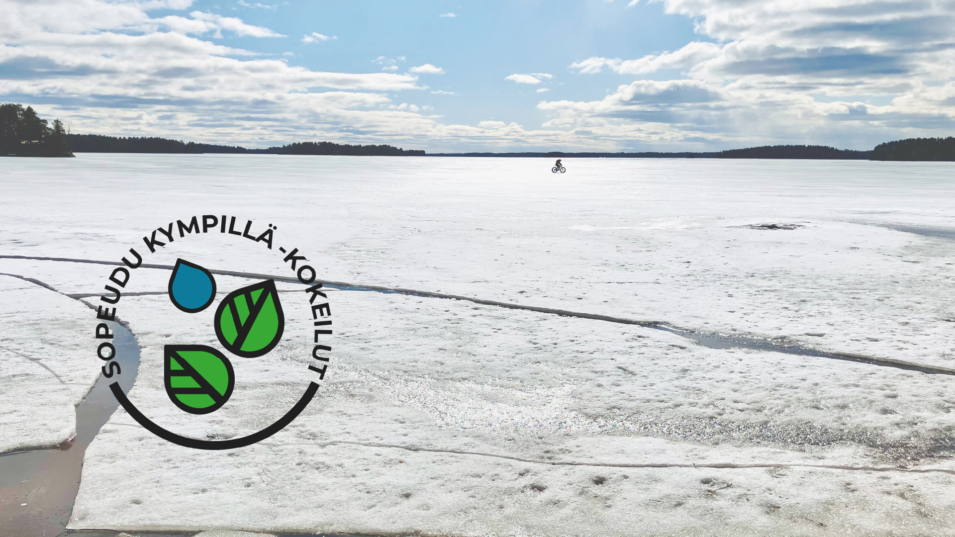 Jäätä, kaukana pyöräilijä